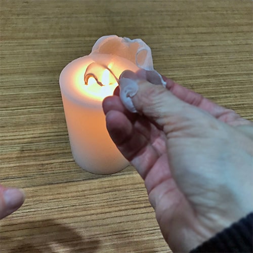 Curling petals with candle heat