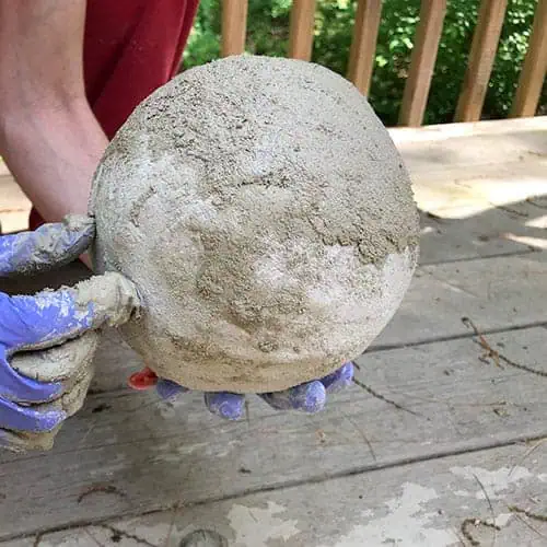 finishing 2nd side of cement balloon planter