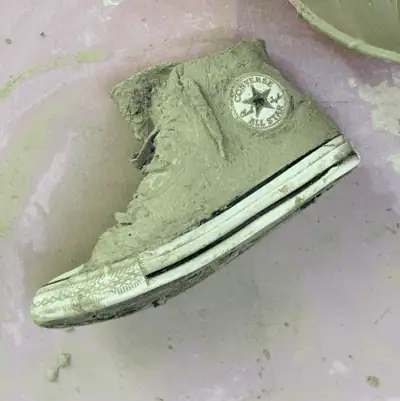 sneaker with cement converse logo