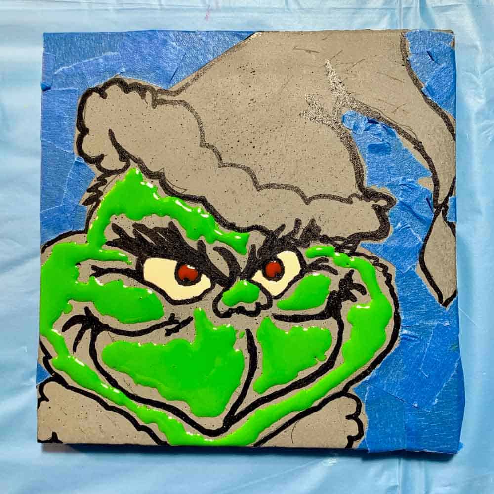 DIY Cement Grinch Decor painted with green