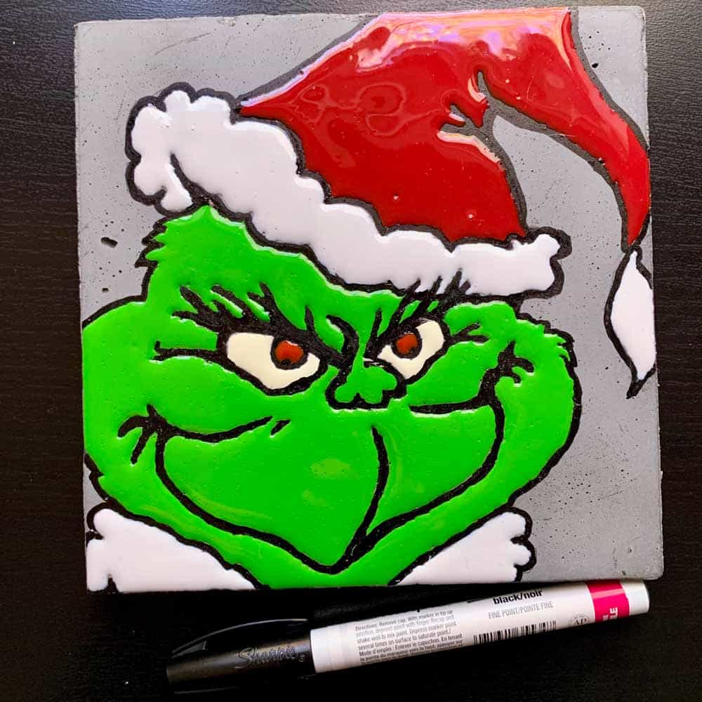 DIY Cement Grinch Decor with paint marker