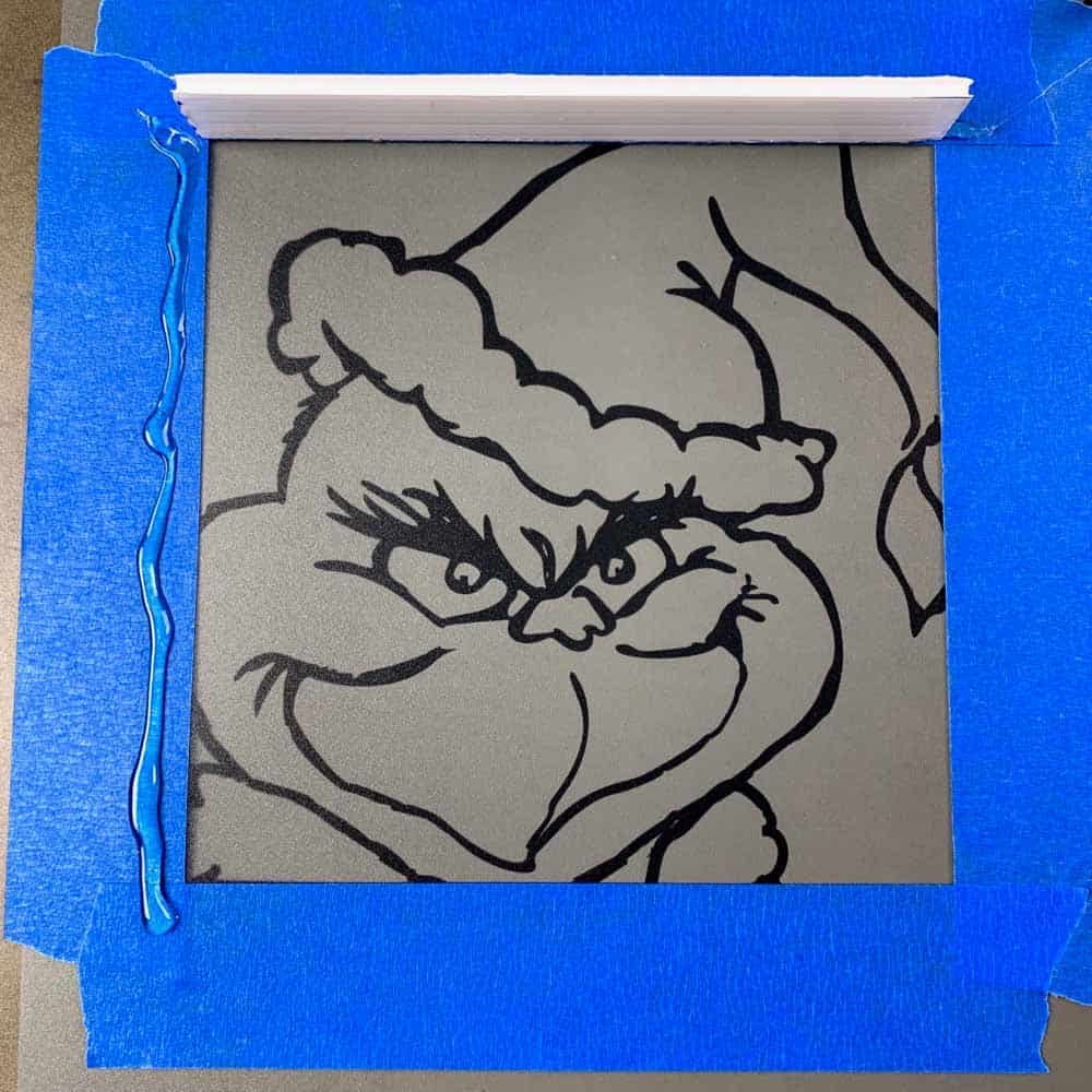 grinch with glue and plastic wall mold