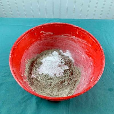 white pigment in cement mix and bowl