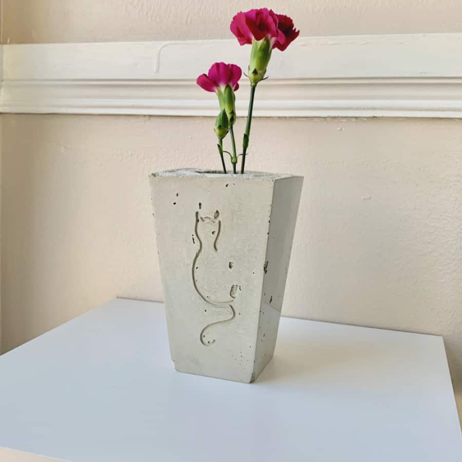 DIY cement vase with cat design recessed