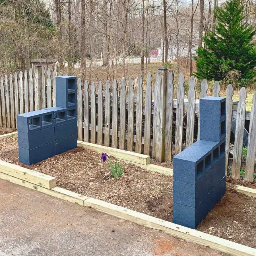 base and arms of cinder block bench without wood posts