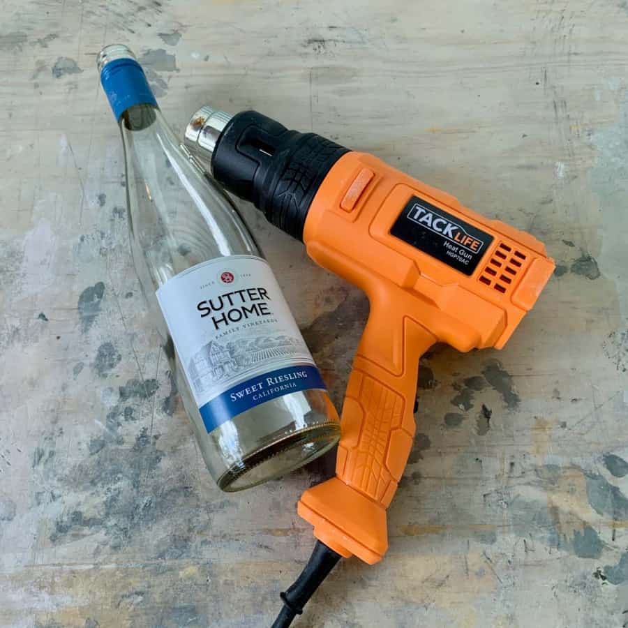 heat gun and wine bottle with label