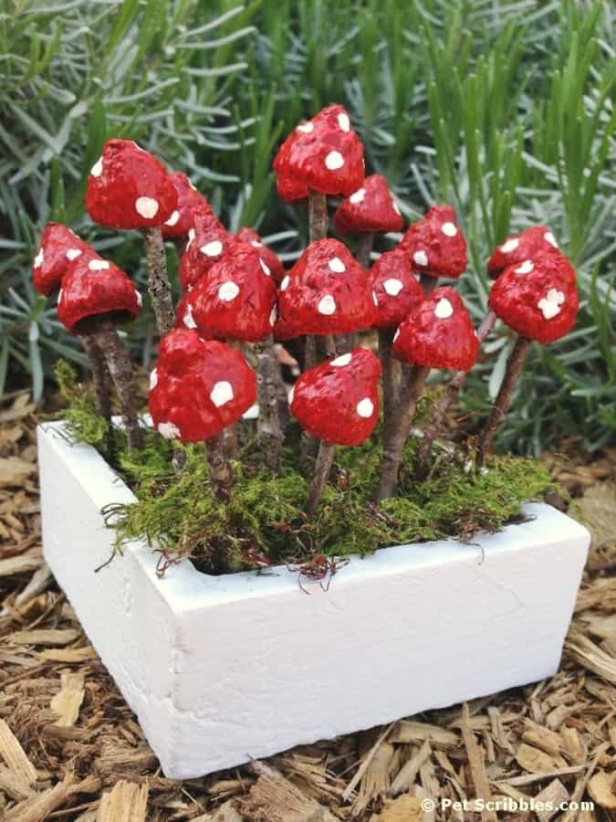 mushrooms painted in a garden- easy garden crafts