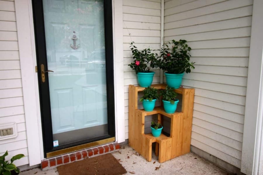 corner tiered wood planter stand tutorial with turquoise pots