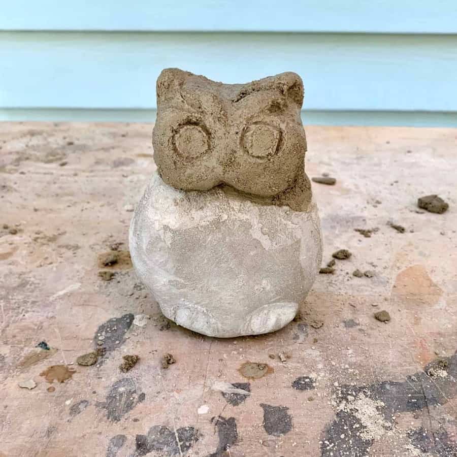 cement owl carved, head mortared to body