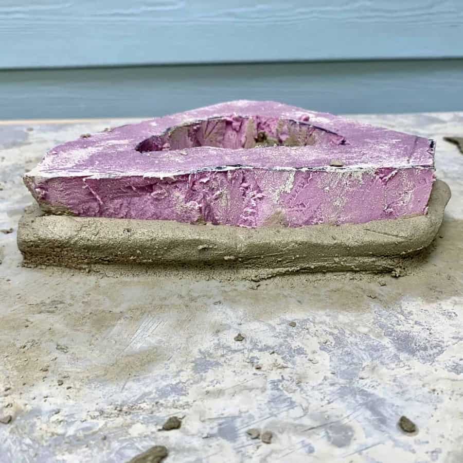 foam on top of cement with curving under