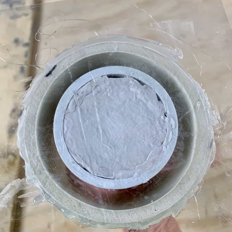 clay pressed into inner mold, outer pvc glued to acetate