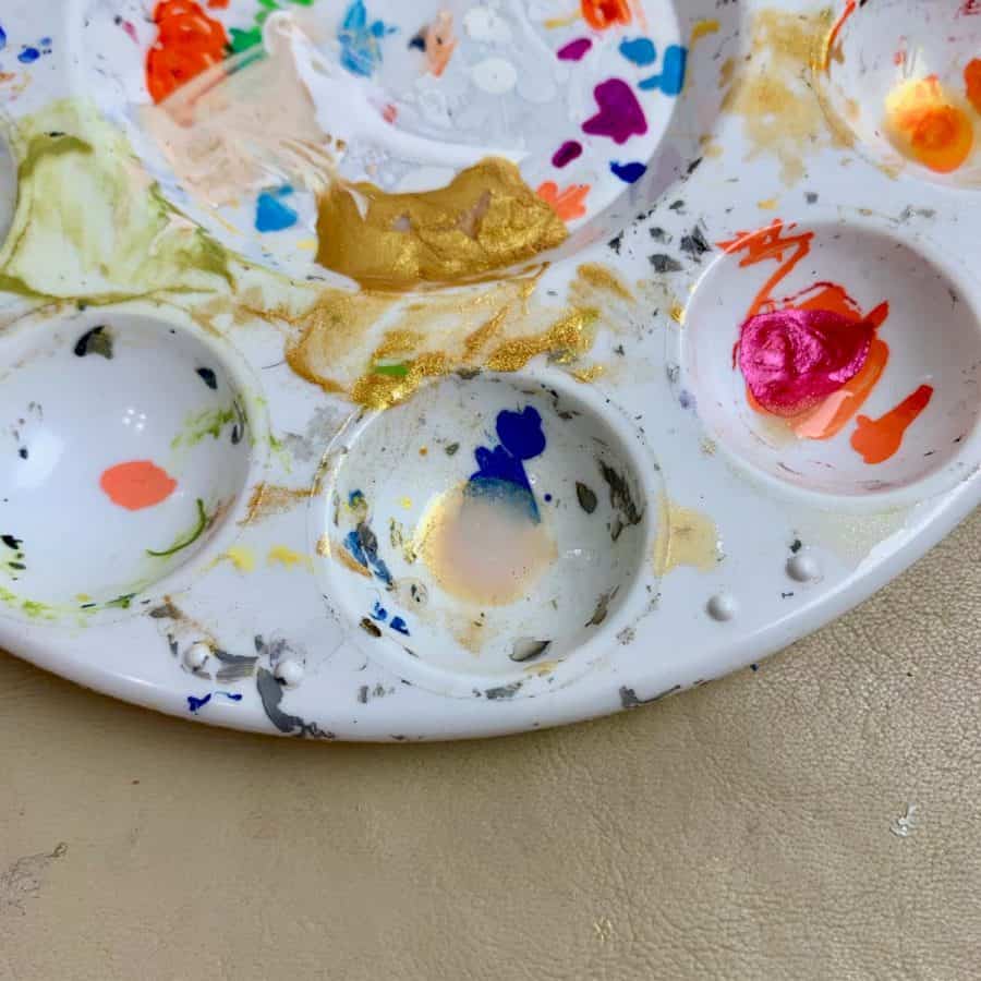metallic paint mixed with water in paint dish