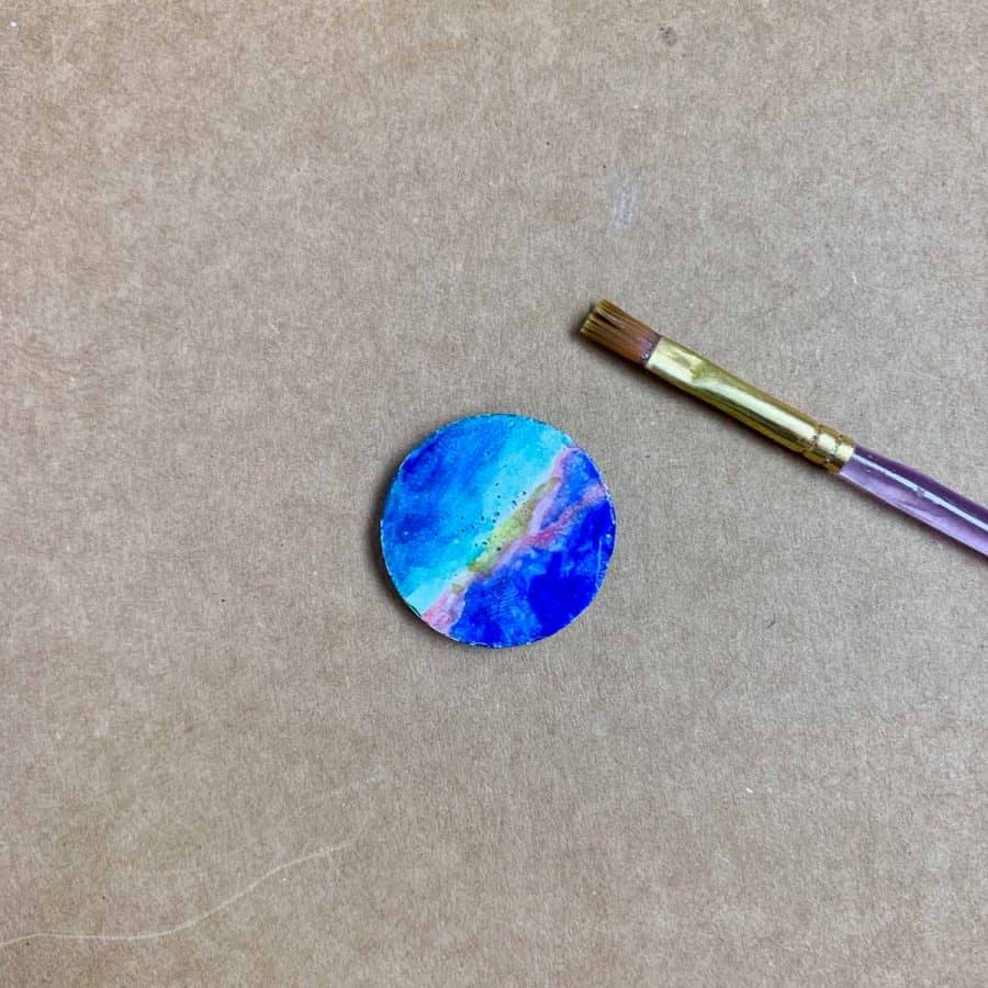 brush next to magnet that was just sealed