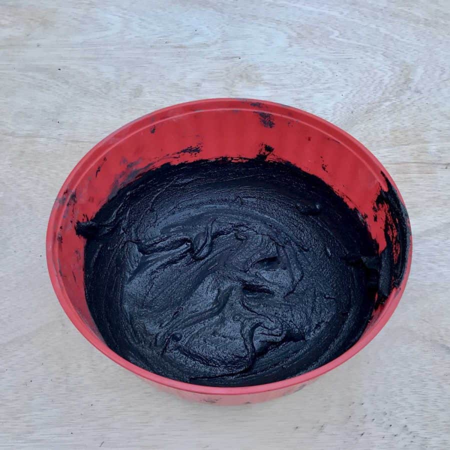 mixed cement with dark black colorant mixed in