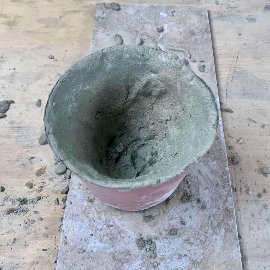 walls built up in planter with cement