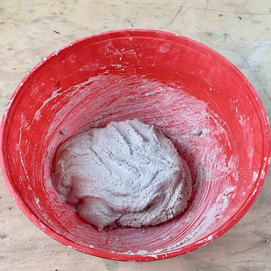 white concrete mix wet in a bowl