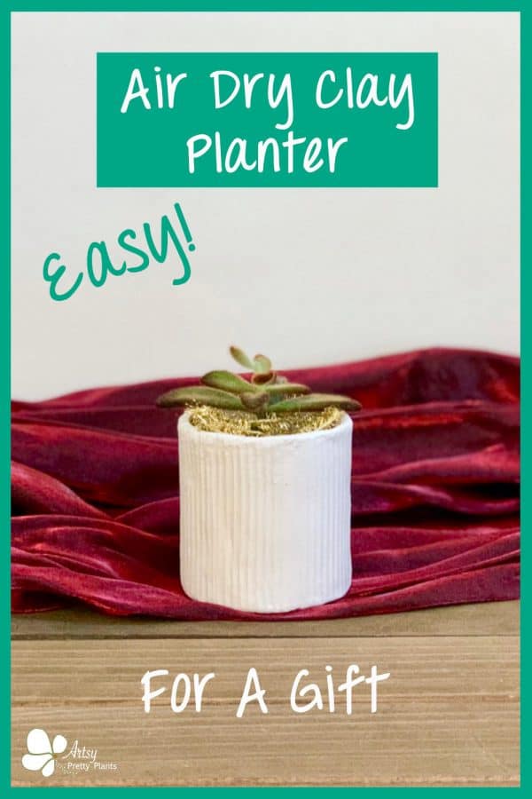 air dry clay planter on christmas red fabric