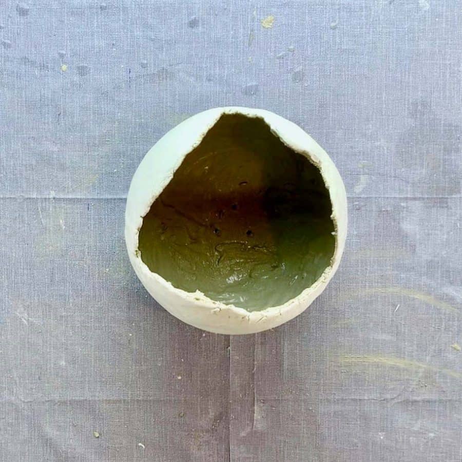 cement coated inside of clay planter
