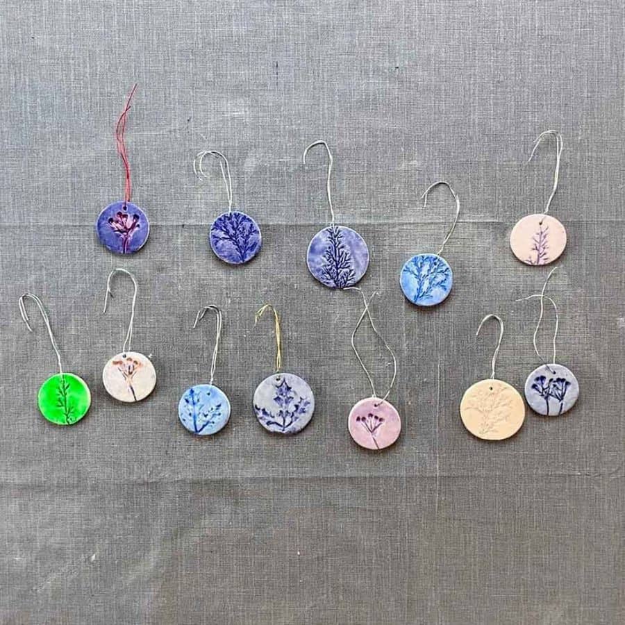 multi colors of clay ornaments with wire hooks