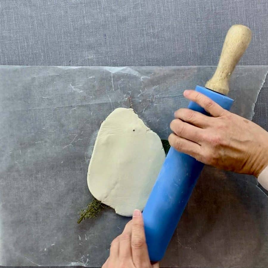 rolling pin rolling clay