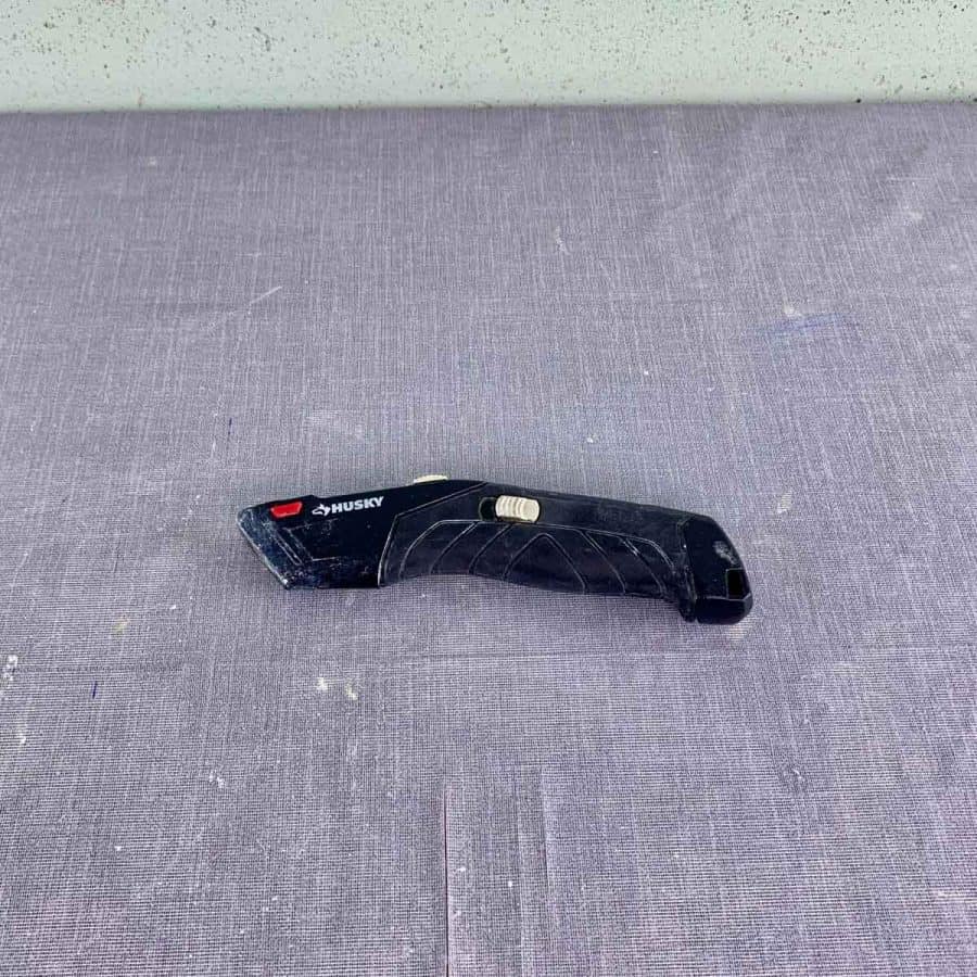utility knife on table- closed