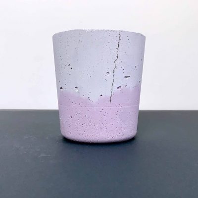 purple marbled quick-made concrete planter with hairline crack down side