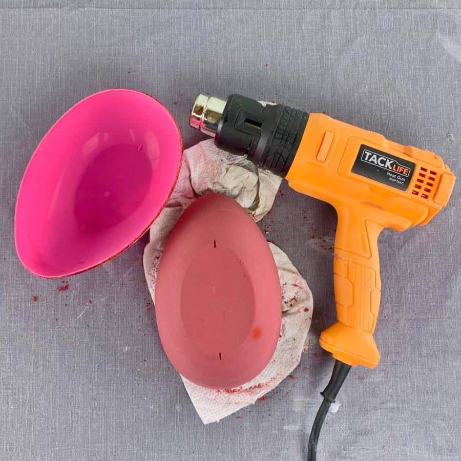 heat gun next to upside down cement bowl with plastic bottom removed