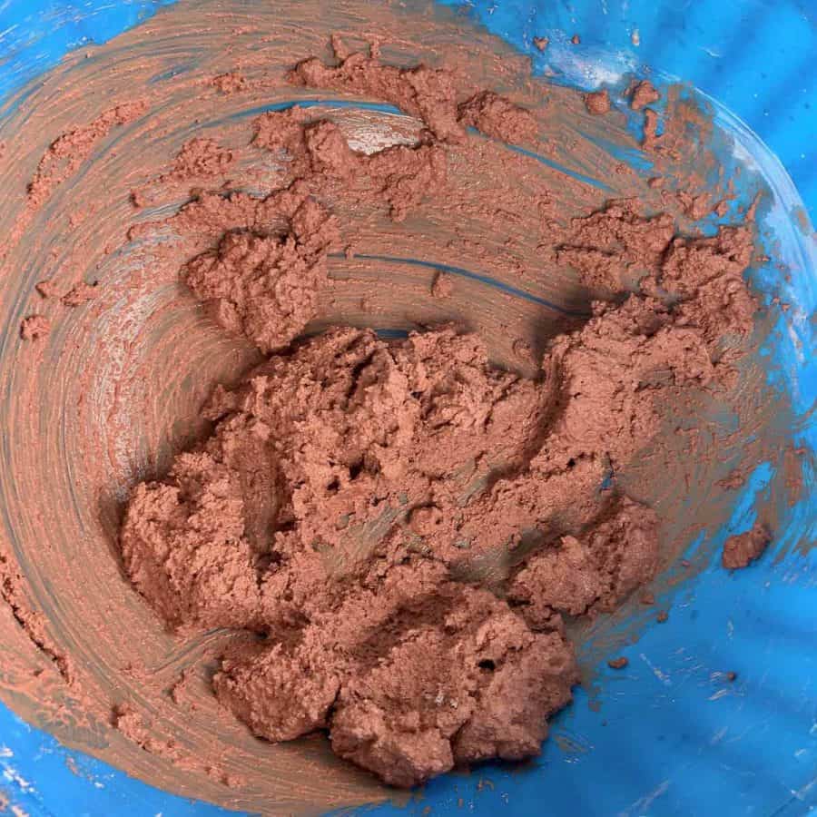 cement mix with bright colored orange-red dye