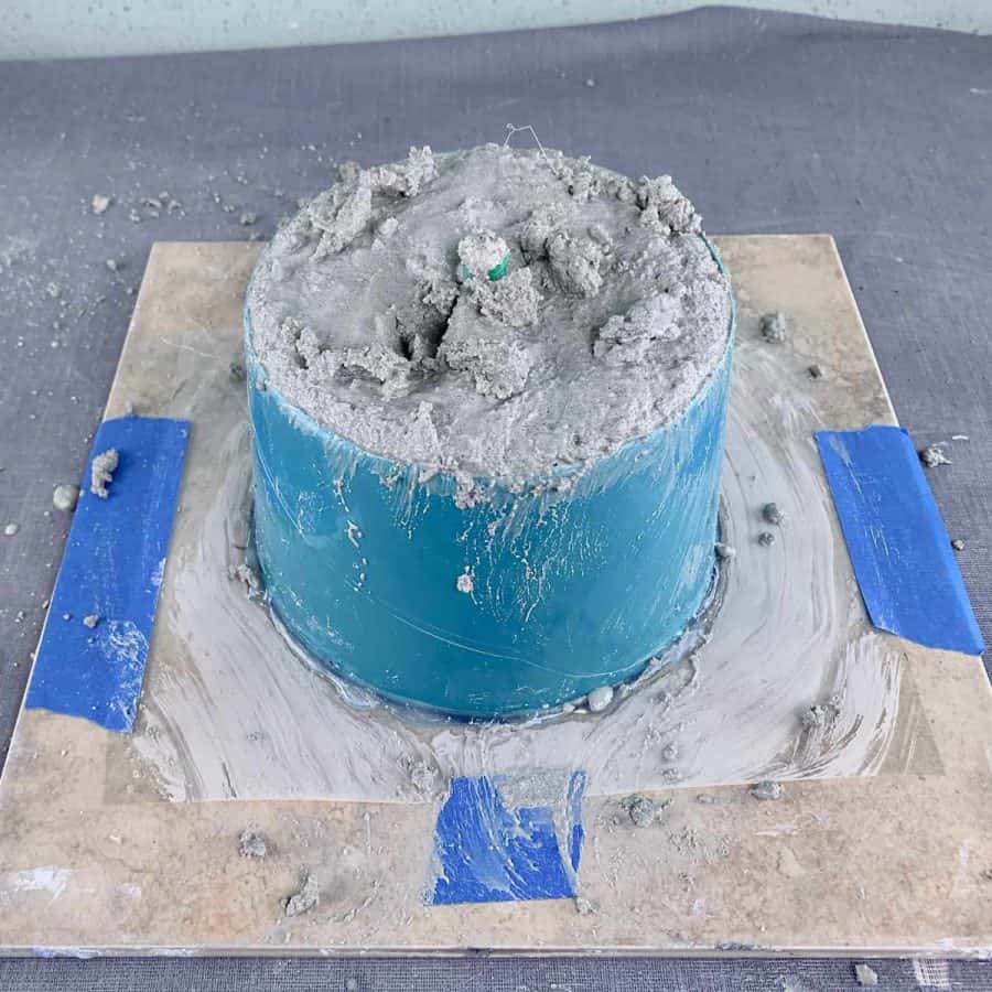 mold filled to top with white concrete