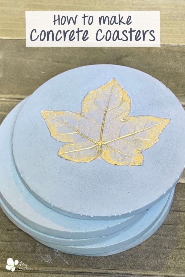 Concrete Coasters- stack of handmade coasters with top leaf painted shimmery gold.