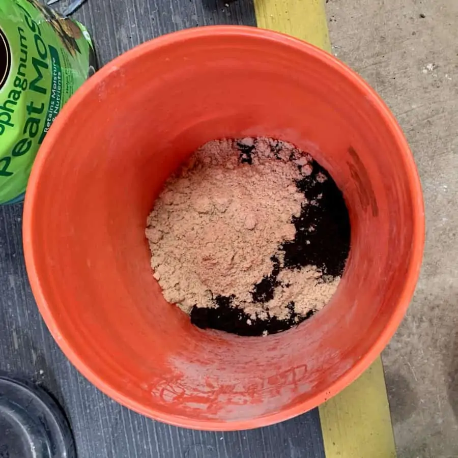 bucket with hypertufa ingredients inside