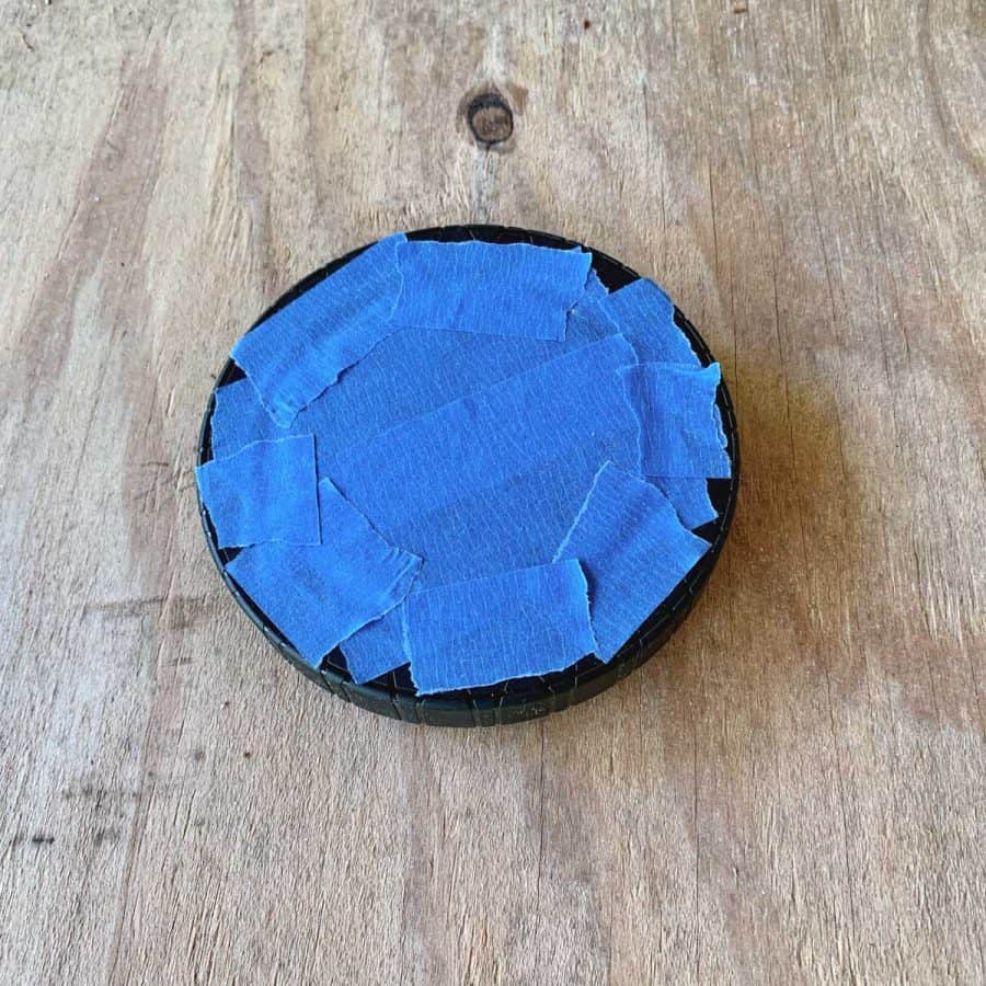 solar light with blue tape cover face