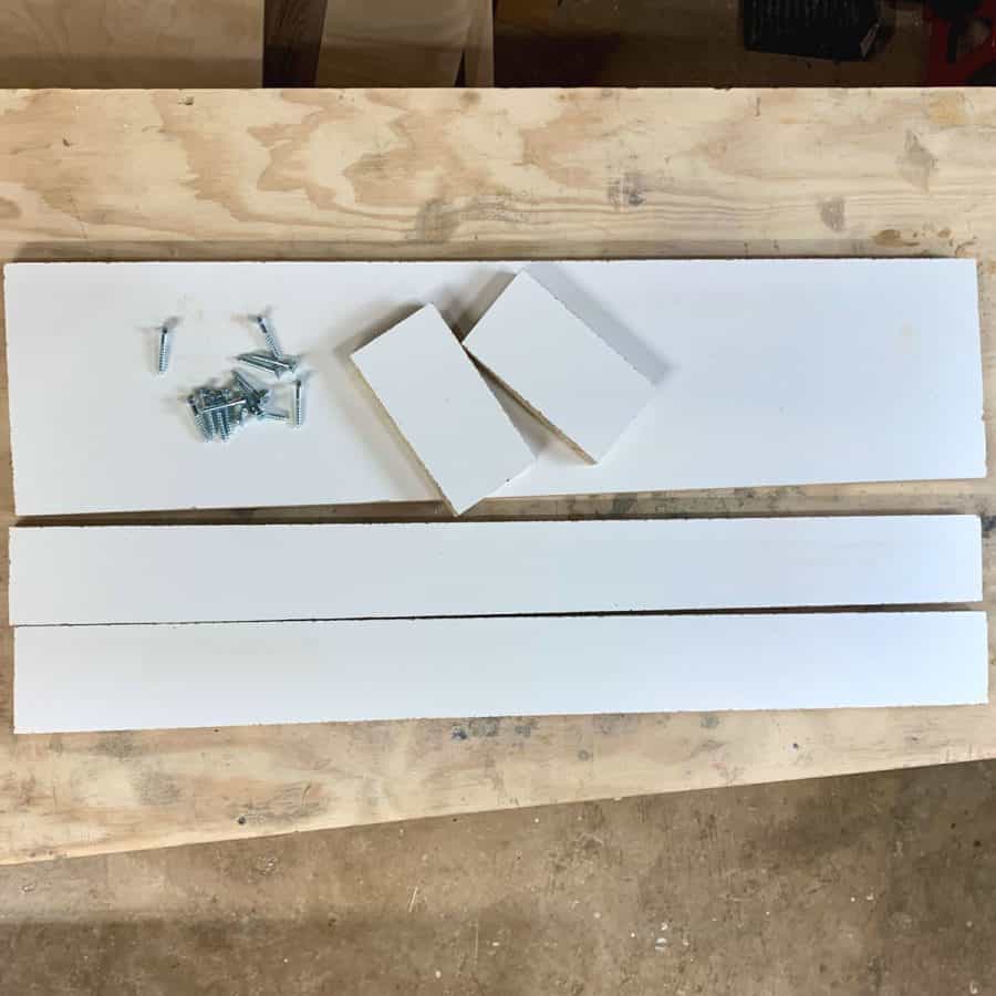 white melamine boards cut to size on a workbench