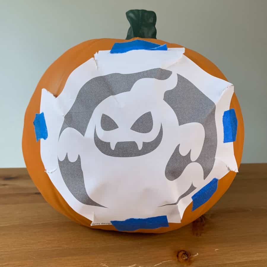 a pdf print out of a ghost, taped to a pumpkin.