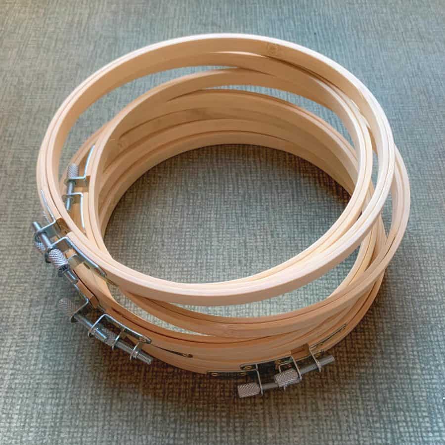 stack of wooden embroidery ring hoops