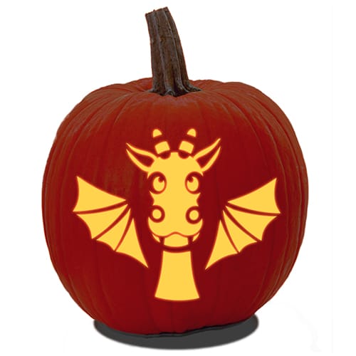 A Jack O' Lantern made from a free cute Dragon pumpkin carving stencil PDF.
