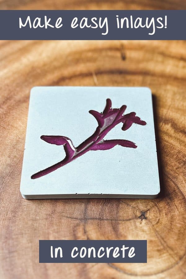 A concrete tile with inset design, filled with purple epoxy.